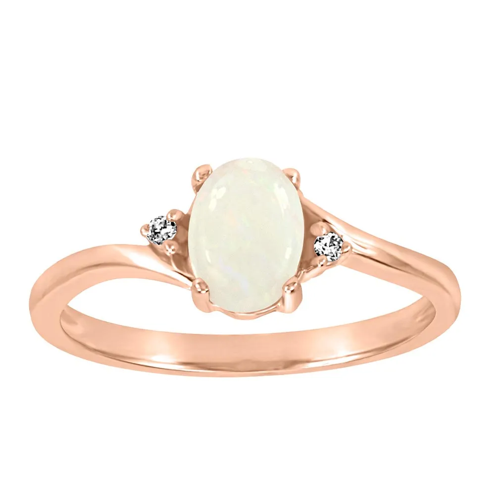 Ring with Opal and .02 Carat TW of Diamonds 10kt Rose Gold