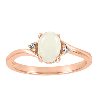 Ring with Opal and .02 Carat TW of Diamonds in 10kt Rose Gold