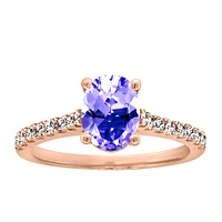 Ring with Tanzanite and .27 Carat TW of Diamonds 14kt Rose Gold