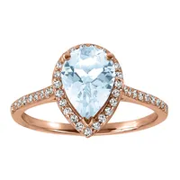 Ring with Aquamarine and .21 Carat TW of Diamonds in 14kt Rose Gold