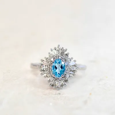 Ring with Blue Topaz and .53 Carat TW of Diamonds in 14kt White Gold