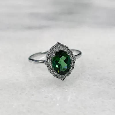 Ring with 8X6MM Oval Green Tourmaline and .08 Carat TW of Diamonds 10kt White Gold