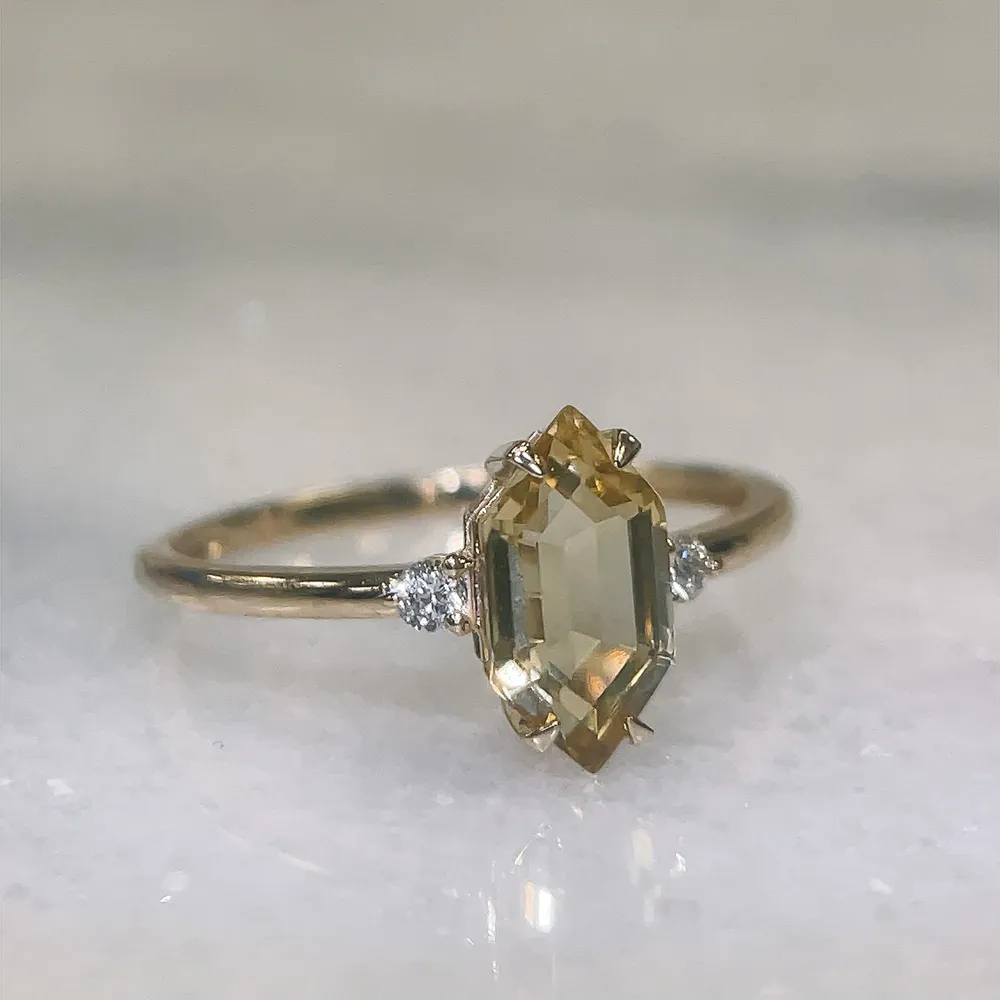 Ring with 10X5MM Champagne Quartz and .06 Carat TW of Diamonds in 14kt Yellow Gold