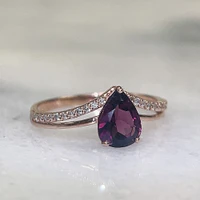 Ring with 8X6MM Pear Shape Rhodolite Garnet and .11 Carat TW of Diamonds 10kt Rose Gold