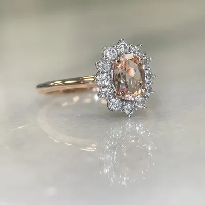 Ring with 7X5MM Oval Morganite and .40 Carat TW of Diamonds in 14kt Rose Gold