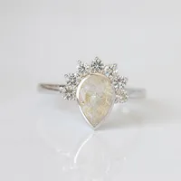 Ring with 10X6MM Pear Rutilated Quartz and White Topaz in 14kt White Gold