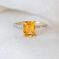 Ring with 8X6MM Emerald Cut Citrine with .20 Carat TW of Diamonds in 14kt Yellow Gold