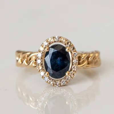 Ring with 8X6MM Oval Blue Sapphire and .16 Carat TW of Diamonds 10kt Yellow Gold