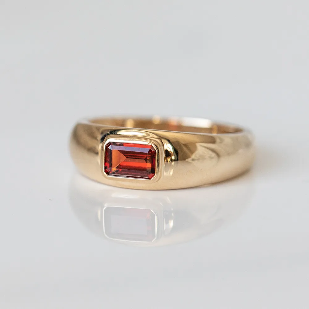 Ring with 5.5X3.5MM Emerald Cut Garnet in 10kt Yellow Gold