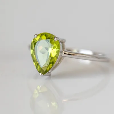 Ring with 8X10MM Pear Shape Peridot in 10kt White Gold