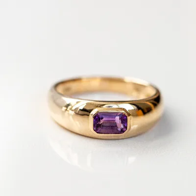 Ring with 5.5X3.5MM Emerald Cut Amethyst in 10kt Yellow Gold