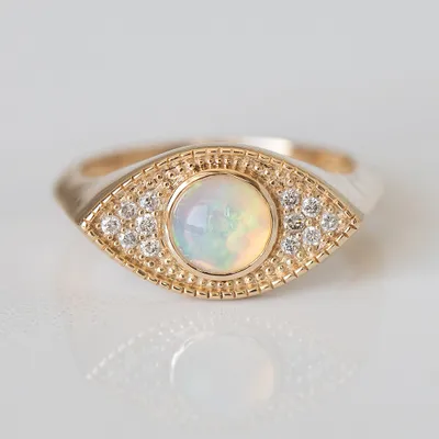 Ring with Round Opal and .20 Carat TW of Diamonds in 10kt Yellow Gold