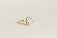 Ring with 8X6MM Oval Aquamarine and .05 Carat TW of Diamonds 14kt Yellow Gold