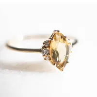 Ring with 9X5MM Marquise Champagne Quartz and .10 Carat TW of Diamonds 14kt Yellow Gold