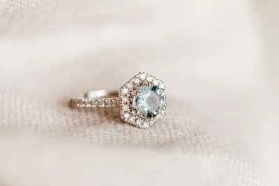 Ring with 7MM Round Aquamarine and .45 Carat TW of Diamonds 14kt White Gold