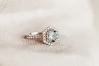 Ring with 7MM Round Aquamarine and .45 Carat TW of Diamonds 14kt White Gold