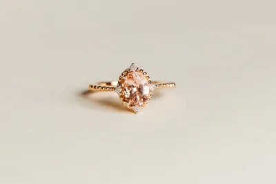 Ring with 8X6MM Oval Morganite and .05 Carat TW of Diamonds in 14kt Rose Gold