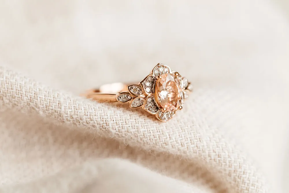 Ring with 7X5MM Oval Morganite and .10 Carat TW of Diamonds in 14kt Rose Gold