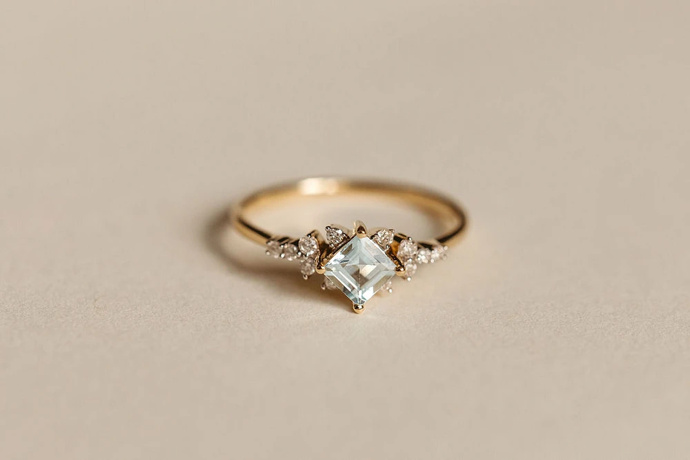 Ring with 4X4MM Princess Cut Aquamarine and .12 Carat TW of Diamonds in 14kt Yellow Gold