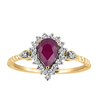 Ring with 7X5MM Pear Shaped Ruby and .26 Carat TW of Diamonds in 10KT  Yellow Gold