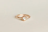 Ring with 5MM Aquamarine and .03 Carat TW of Diamonds 10kt Rose Gold