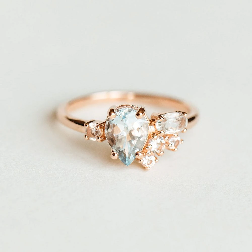 Ring with 8X6MM Pear Shape Aquamarine and White Topaz 14kt Rose Gold