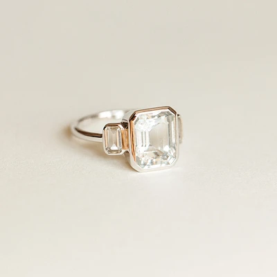 Ring with 10X8MM Emerald Cut Aquamarine and White Topaz in 10kt White Gold