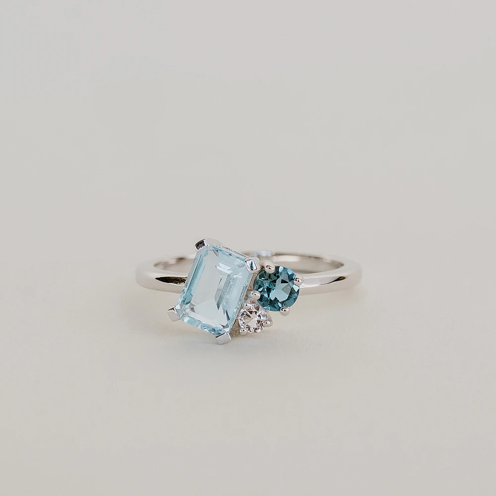 Ring with 7X5MM Emerald Cut Sky Blue Topaz, London Topaz and White 10kt Gold