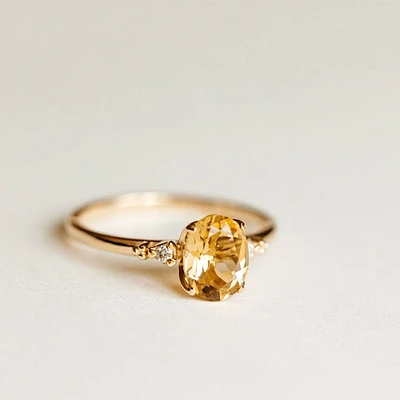 Ring with 8X6MM Oval Champagne Quartz and .04 Carat TW of Diamonds 14kt Yellow Gold