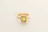 Ring with 7X5MM Octagonal Peridot and .05 Carat TW of Diamonds 14kt Yellow Gold