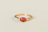 Ring with Oval 7X5MM Pink Tourmaline and .10 Carat TW of Diamonds in 14kt Rose Gold