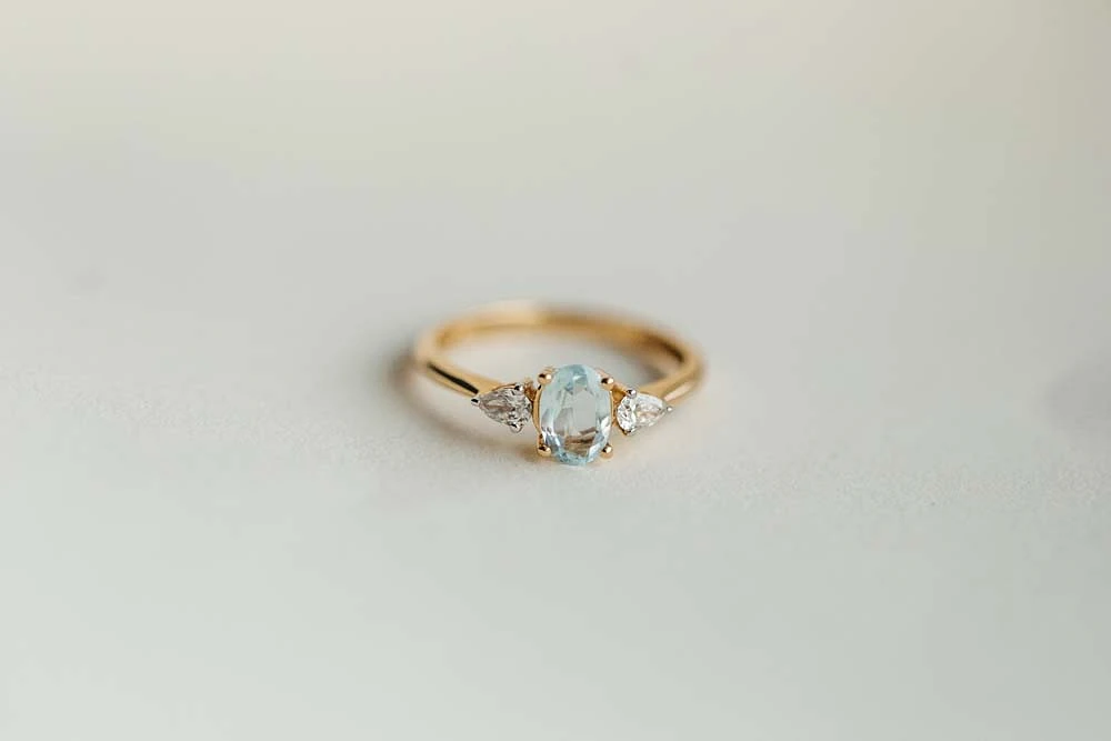 Ring with Oval 7X5MM Aquamarine and .20 Carat TW of Diamonds 14kt Yellow Gold