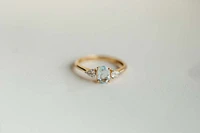 Ring with Oval 7X5MM Aquamarine and .20 Carat TW of Diamonds 14kt Yellow Gold