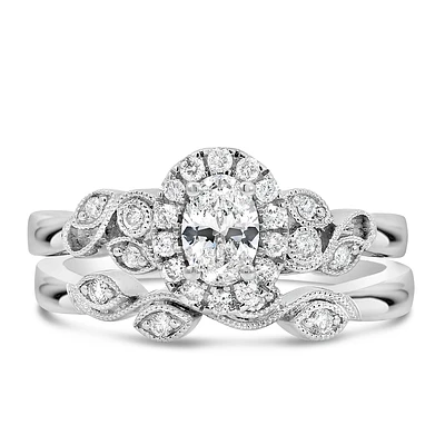 Halo Engagement Ring with .63 Carat TW of Diamonds in 14kt White Gold