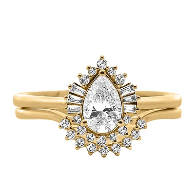 Halo Bridal Set with .70 Carat TW of Diamonds in 14kt Yellow Gold