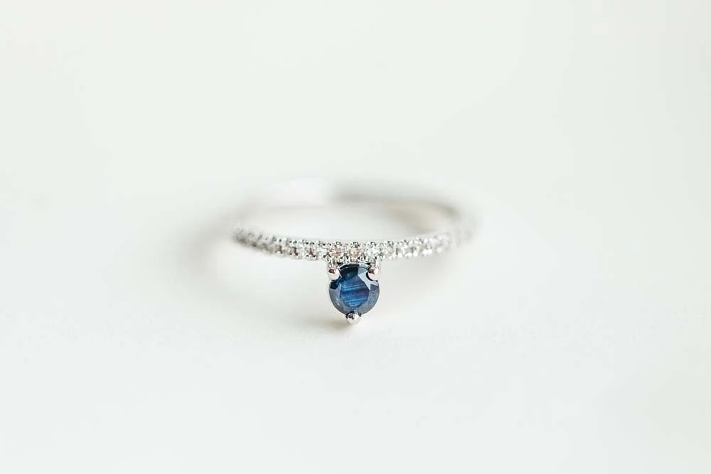 Ring with 3.8MM Round Blue Sapphire and .12 Carat TW of Diamonds in 14kt White Gold