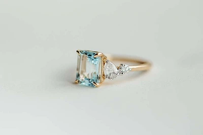 Ring with 9X7MM Emerald Cut Aquamarine and .33 Carat TW of Diamonds 14kt Yellow Gold