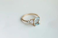 Ring with 9X7MM Emerald Cut Aquamarine and .33 Carat TW of Diamonds 14kt Yellow Gold