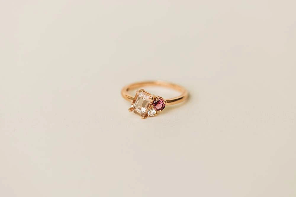 Ring with 7X5MM Emerald Cut Morganite, Pink Tourmaline and White Topaz in 10kt Rose Gold