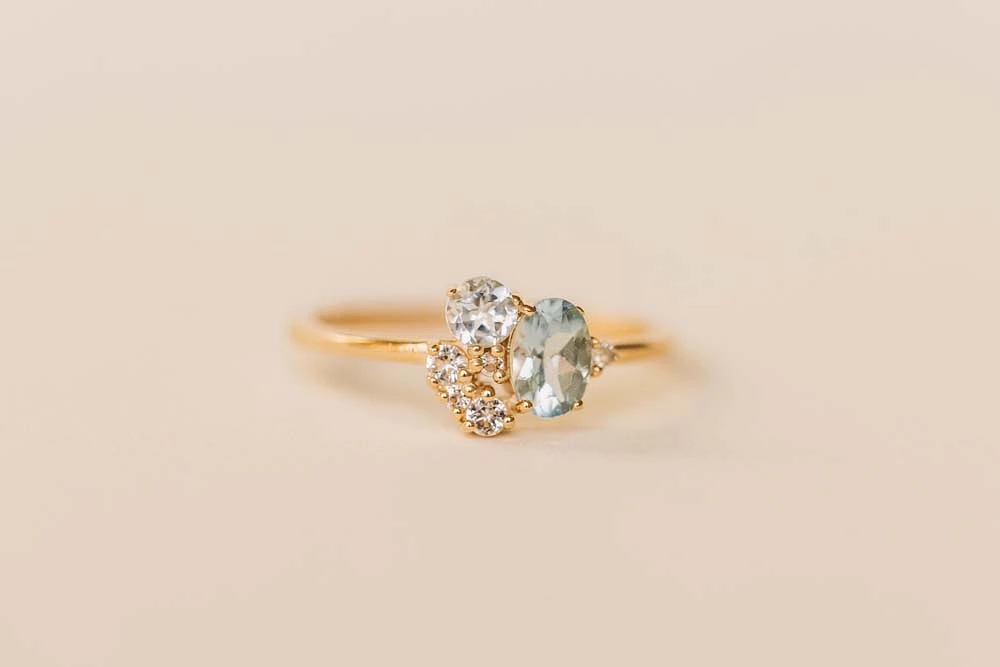 Ring with 6X4MM Oval Blue Topaz, Round Aquamarine and Blue Topaz in 10kt Yellow Gold