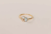 Ring with 6X4MM Oval Blue Topaz, Round Aquamarine and Blue Topaz in 10kt Yellow Gold