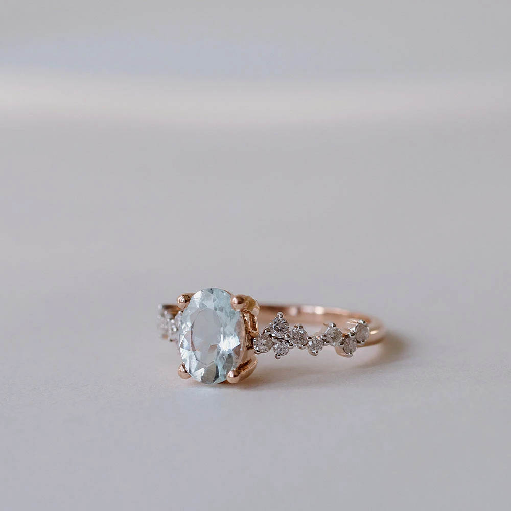 Ring with 8X6MM Oval Aquamarine and .25 Carat TW of Diamonds 14kt Rose Gold