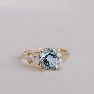 Ring with 8MM Round Aquamarine and .15 Carat TW of Diamonds 14kt Yellow Gold