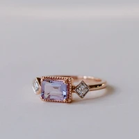 Ring with Emerald Cut Pink Amethyst and .08 Carat TW of Diamonds 14kt Rose Gold