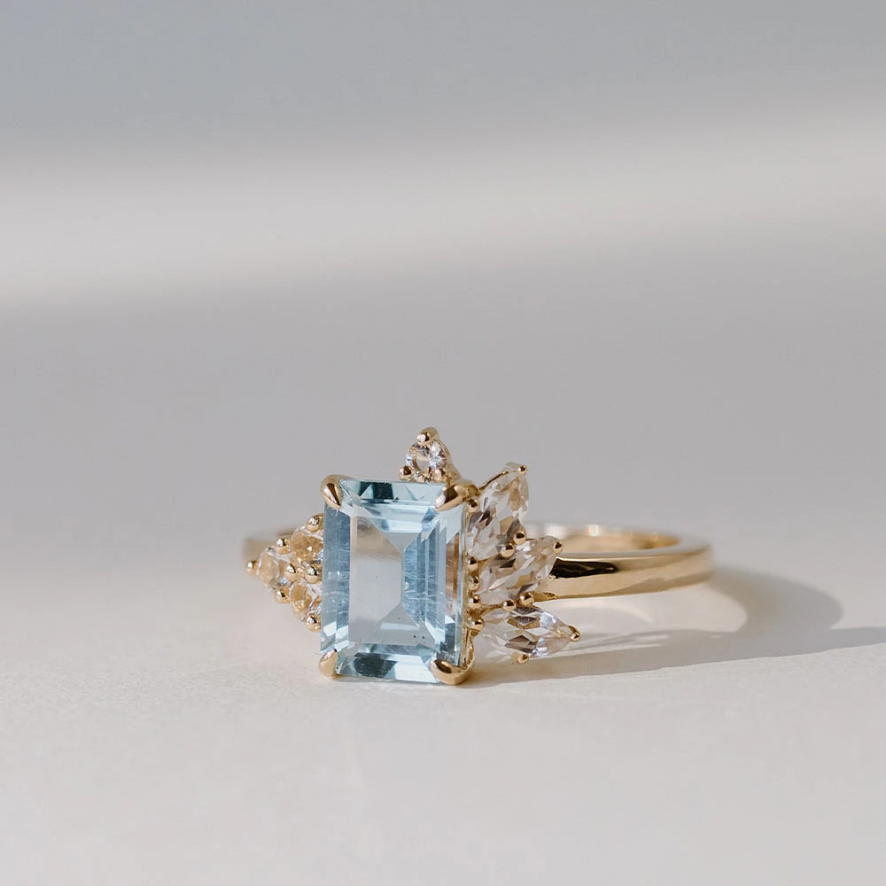 Ring with 8X6MM Emerald Cut Aquamarine and Round Marquise White Topaz 14kt Yellow Gold