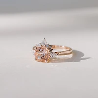 Ring with 7MM Round Morganite and .25 Carat TW of Diamonds 14kt Rose Gold