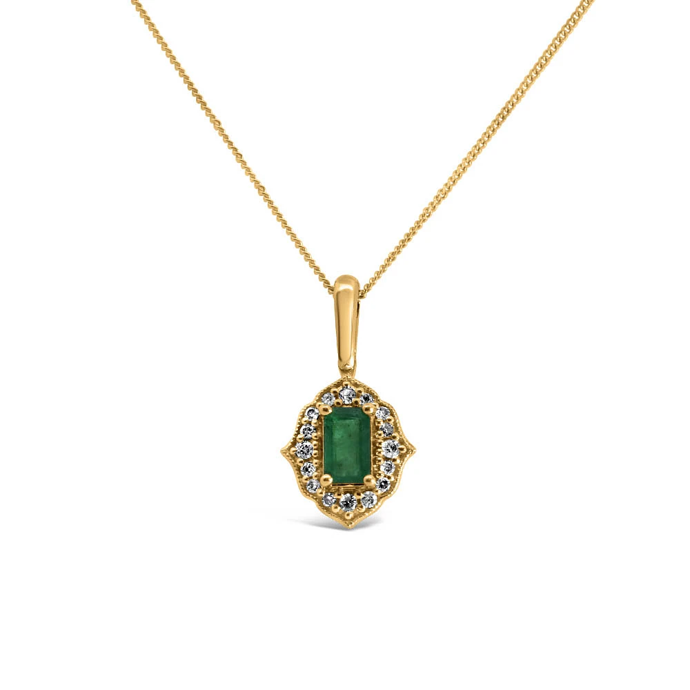 5X3MM Pendant with Emerald and .09 Carat TW of Diamonds 10kt Yellow Gold