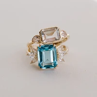 Ring with 8X5MM Emerald cut, Green Amethyst, & Pear Shaped White Topaz 10kt yellow gold