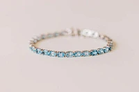 7.5″ Tennis Bracelet with Blue Topaz Sterling Silver