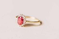 Halo Ring with .13 Carat TW of Diamonds and 7x5MM Oval Ruby 10kt Yellow Gold